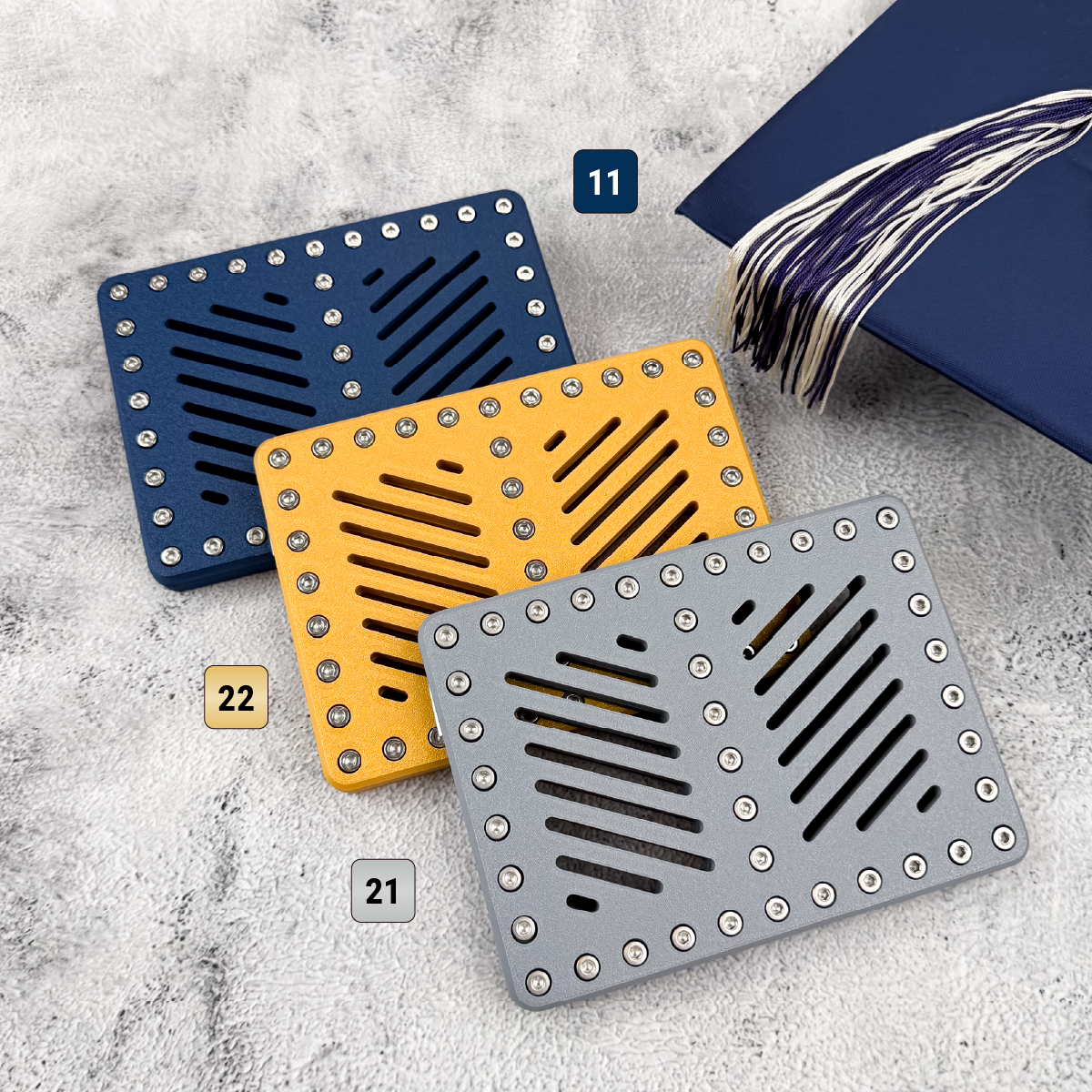Navy blue, gold, and gray Lockup Duo graduation money holders for college graduation gifts